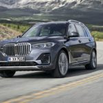 Leased BMW X7 driving on street